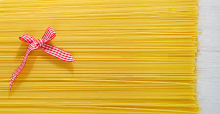 Uncooked spaghetti backgroundの写真素材