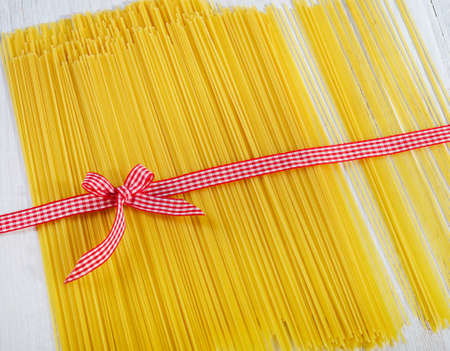 Uncooked spaghetti backgroundの写真素材