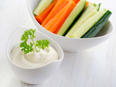 Fresh vegetables with dip. Selective focus