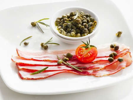 Capers with bacon slicesの写真素材