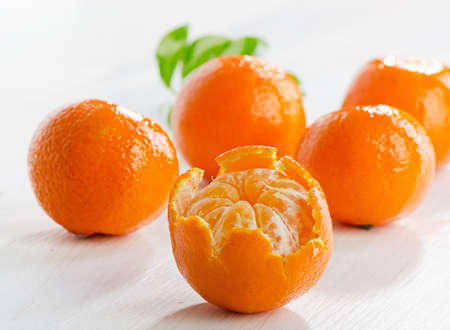 Tangerines on a wooden tableの写真素材