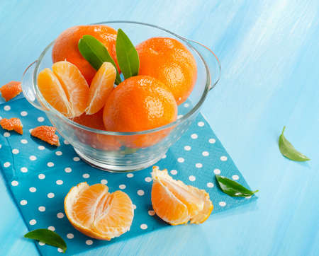 Tangerines in glass bowlの写真素材