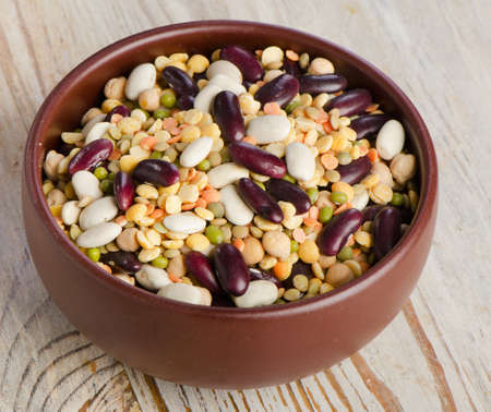 Beans on wooden tableの写真素材