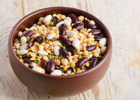 Beans on wooden tableの写真素材