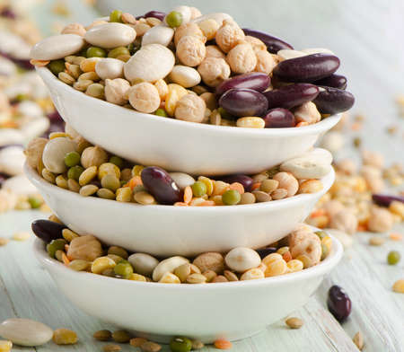 Beans on wooden tableの写真素材