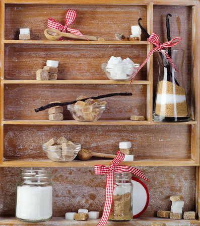 Various kinds of sugar  in  wooden trayの写真素材