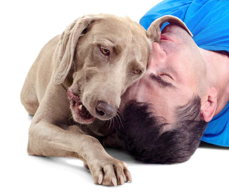 Happy man with  dog isolated on white backgroundの写真素材