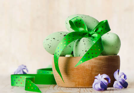 Easter eggs on a wooden table . Selective focusの写真素材
