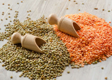lentils on a wooden table . selective focusの写真素材