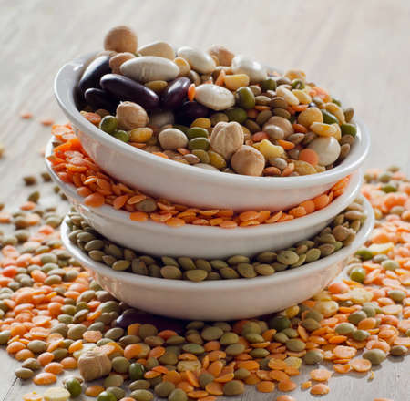 Beans and lentil on a wooden table . selective focusの写真素材