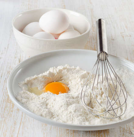 baking ingredients on a wooden table . Selective focusの写真素材