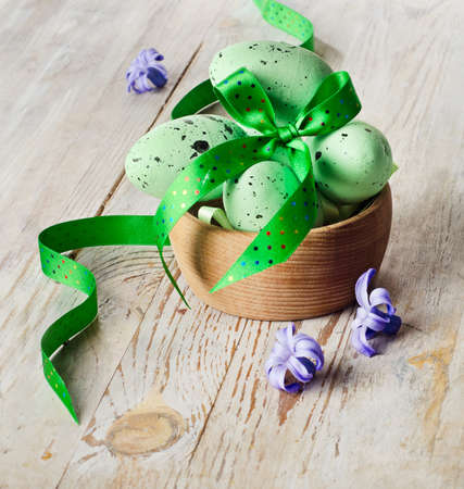 Easter eggs on a wooden table . Selective focusの写真素材