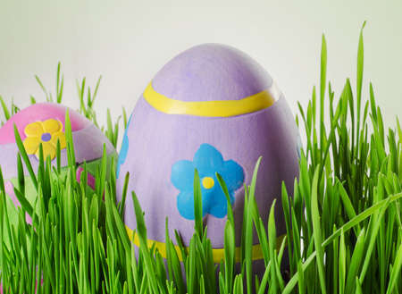 Decorated easter eggs in the grass. Selective focusの写真素材