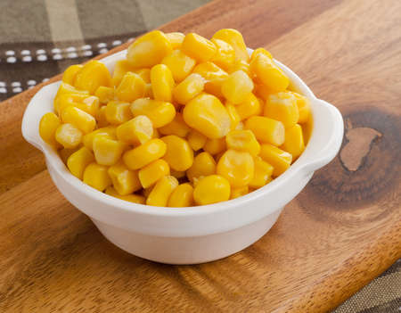 Sweet corn in white bowl. Selective focus