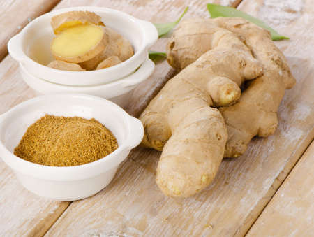 Ginger on a wooden table. Selective focusの写真素材