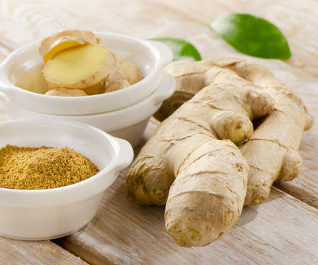 Ginger on a wooden table. Selective focusの写真素材