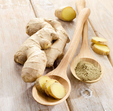 Ginger  in a wooden spoon. Selective focusの写真素材