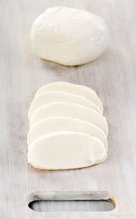 mozzarella on a wooden table. selective focusの写真素材