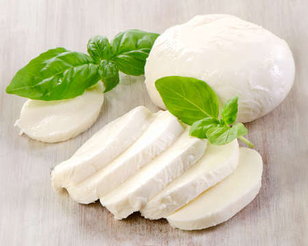 mozzarella on a wooden table. selective focusの写真素材