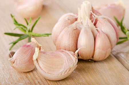 Garlic on a wooden table. Selective focusの写真素材