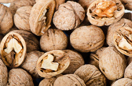 Walnuts background. Selective focus