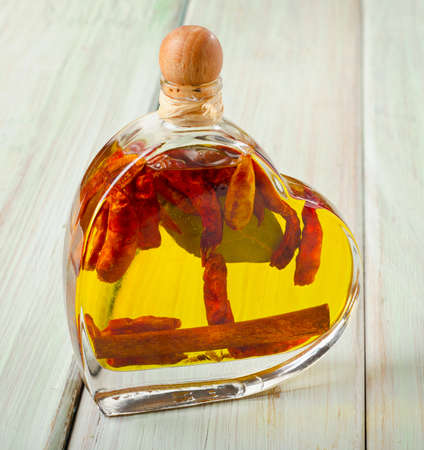 Olive oil on wooden table. Selective focusの写真素材