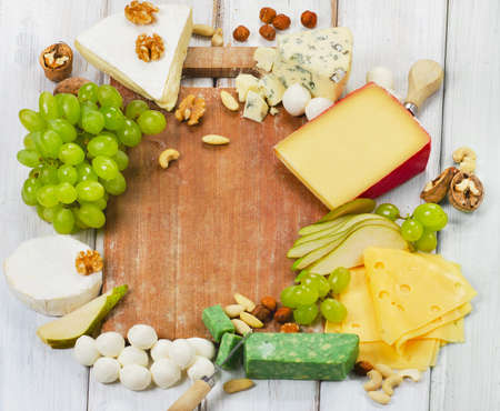 various types of  Cheese with on a wooden table. Selective focusの写真素材