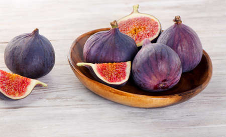 fresh figs on wooden table. Selective focusの写真素材