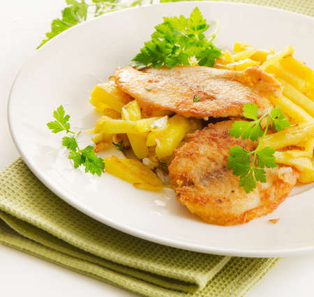 Fish and chips with fresh herbs. Selective focusの写真素材