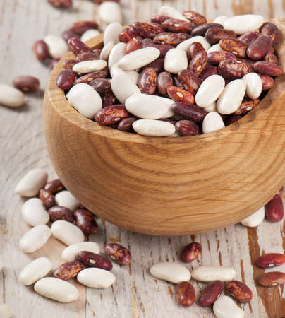 bowl with haricot bean and dried lentils. selective focus