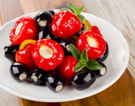 Olives and peppers filed with  cheese. Selective focusの写真素材