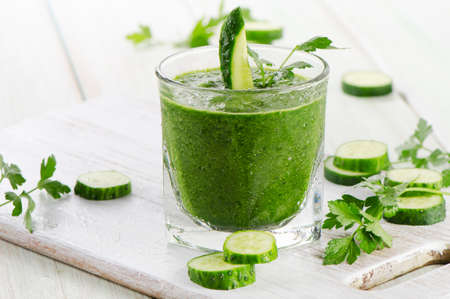 Healthy green smoothie in a glass.  Selective focusの写真素材