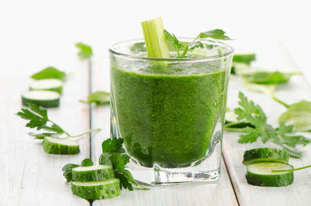 Healthy green smoothie in a glass.  Selective focusの写真素材