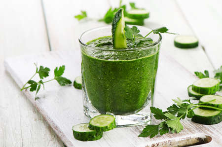 Healthy green smoothie in a glass.  Selective focusの写真素材