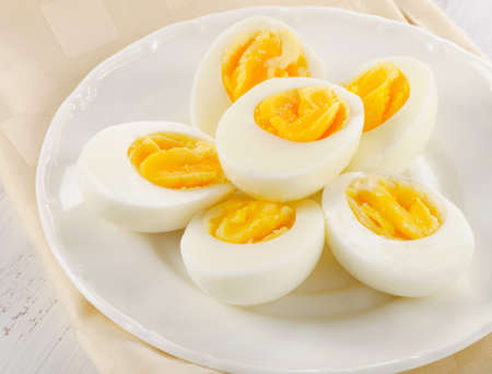 Boiled eggs on  white plate. Selective focusの写真素材