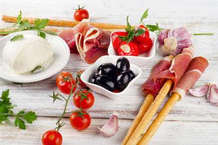 italian appetizer - Mixed Antipasto on a wooden table . Selective focusの写真素材