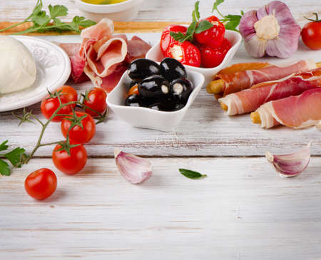 italian appetizer - Mixed Antipasto on a wooden table . Selective focusの写真素材