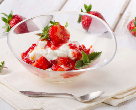 Dessert with strawberries and mint leaf. Selective focusの写真素材