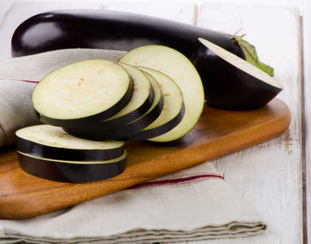 Eggplants  on a wooden table. Selective focusの写真素材