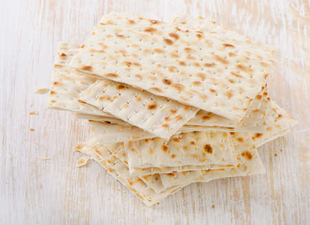 matzoh - jewish passover bread on a wooden table. Selective focusの写真素材