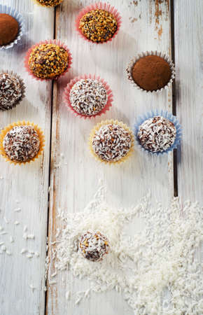 Chocolate sweet handmade candies on a wooden table. Selective focusの写真素材