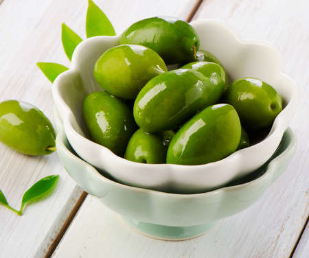 green olives in a bowls. Selective focusの写真素材