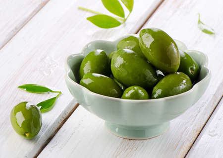 green olives in a bowls. Selective focusの写真素材