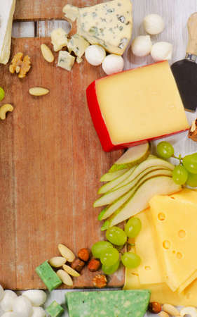 various types of  Cheese with nuts and fruits. Selective focusの写真素材