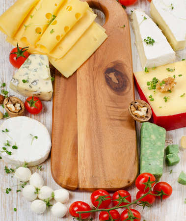 various types of  Cheese with nuts and tomatoes. Selective focusの写真素材