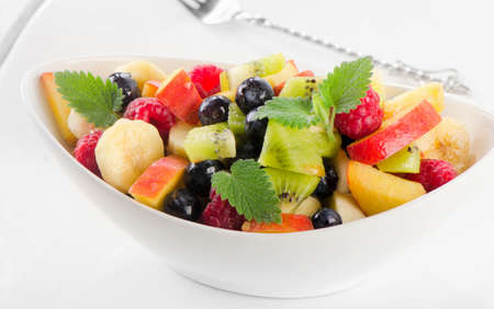 fresh healthy fruit salad with mint leaves. Selective focusの写真素材