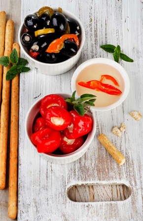 Olives and peppers filed with  cheese. Selective focusの写真素材