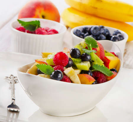 Fresh healthy fruit salad with mint . Selective focusの写真素材