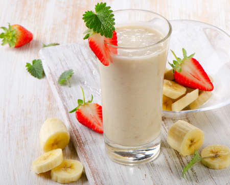 Banana Smoothie with fresh berries. Selective focusの写真素材
