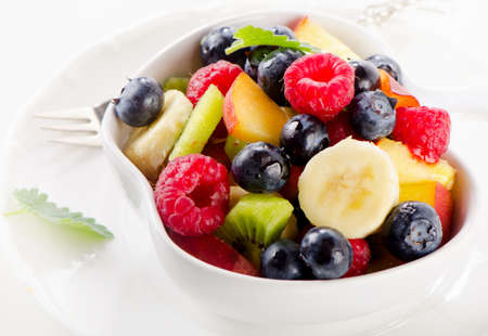 fresh healthy fruit salad with mint leaves. Selective focusの写真素材